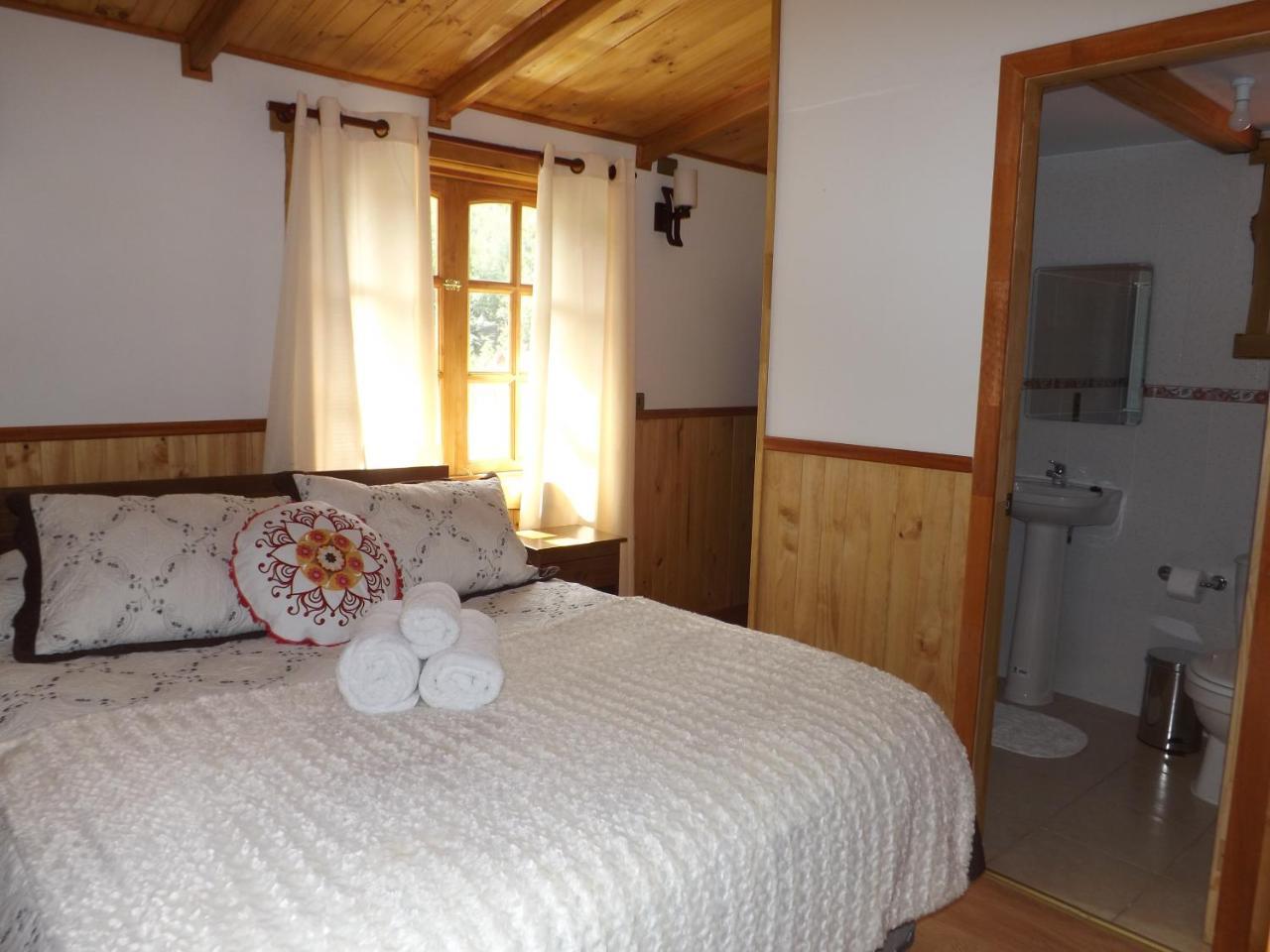 Hostal Robinson Пуерто Пуюхуапи Екстериор снимка